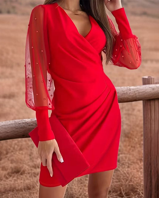 Sukienka z siateczki z dekoltem w serek